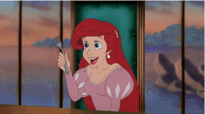 Ariel brushing her hair in The Little Mermaid